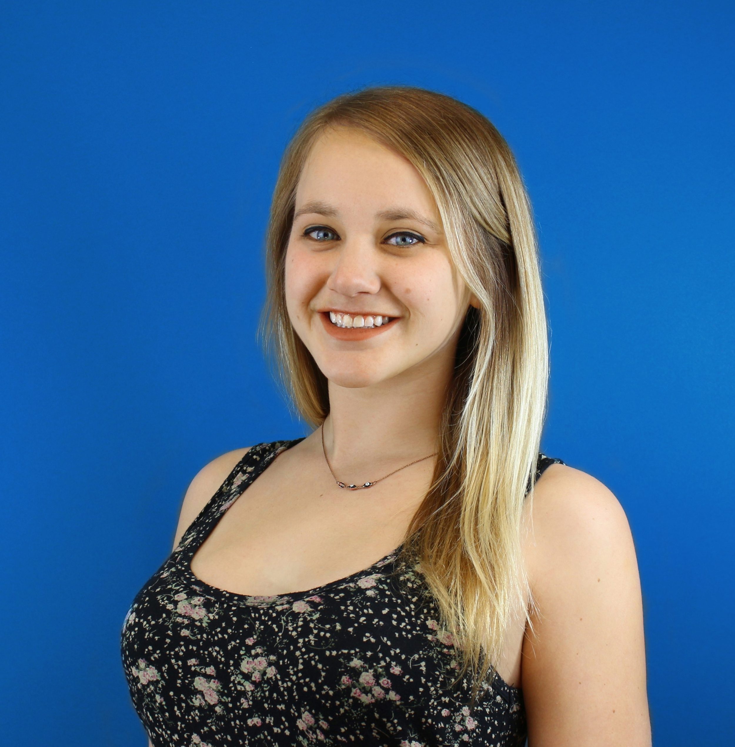 3 Essential SEO Rules for 2021 5 a person sitting at a desk with a laptop and cell phone